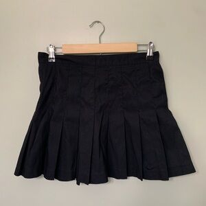 Nike — black pleated women’s large golf skirt